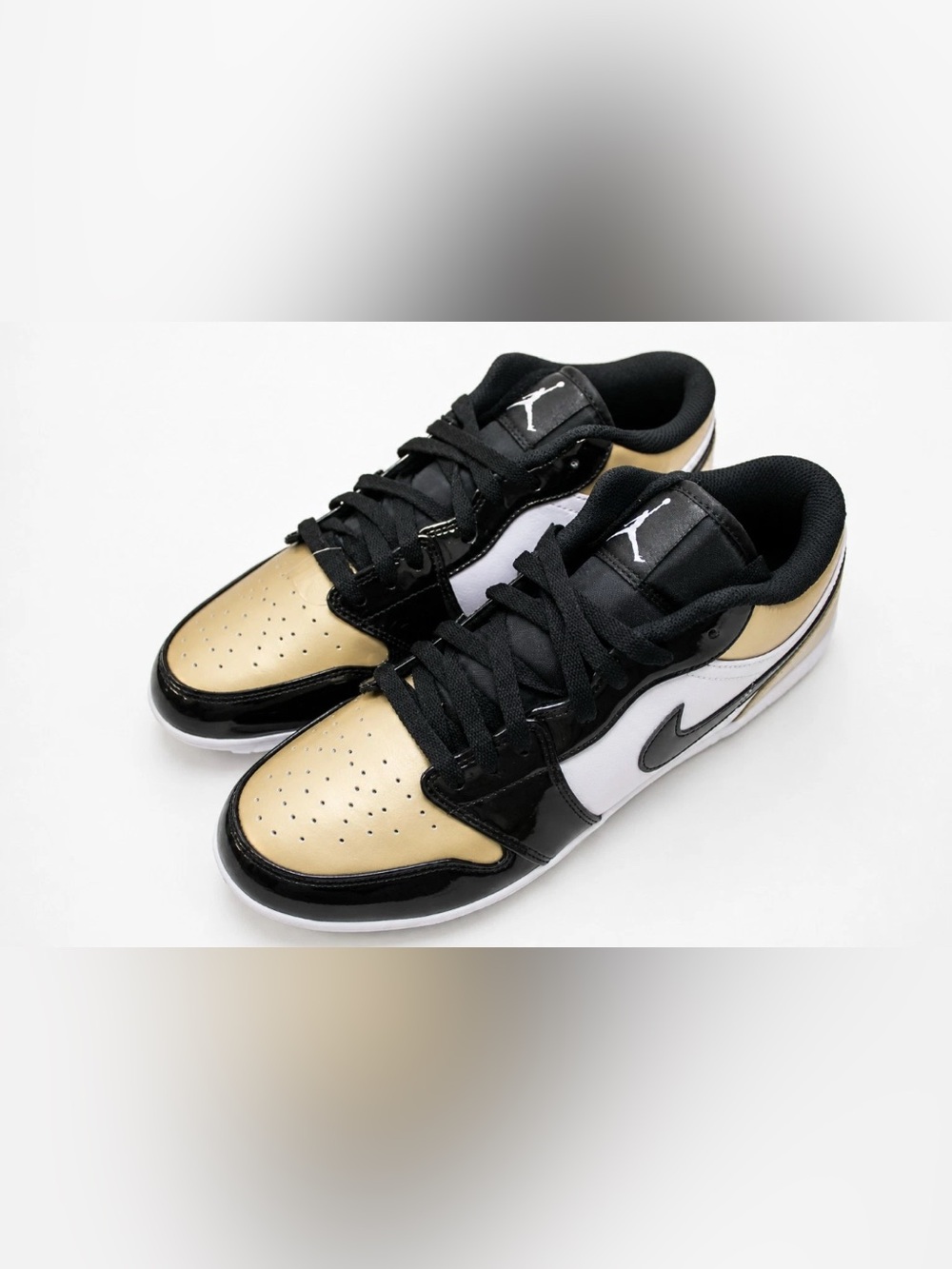 Jordan Low Top football cleats in Gold, Black & White